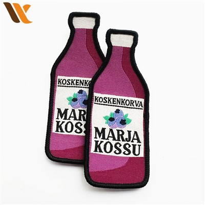 Tampalan Anyaman Dalam Bentuk Botol Jus